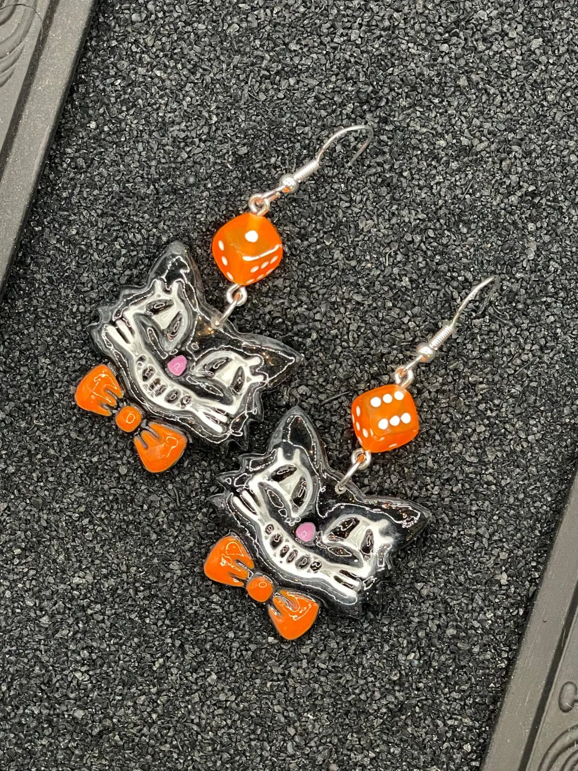 Retro Black Cat with Bowtie Earrings sold by Modcloth