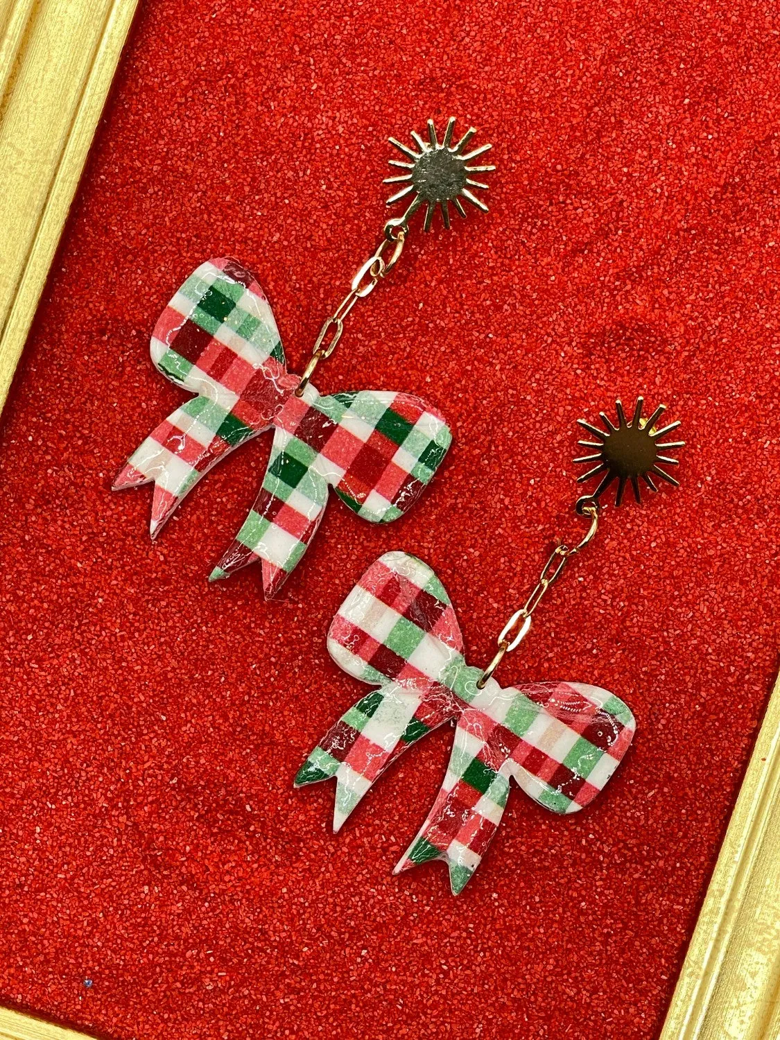 Plaid Holiday Bow Earrings sold by Modcloth