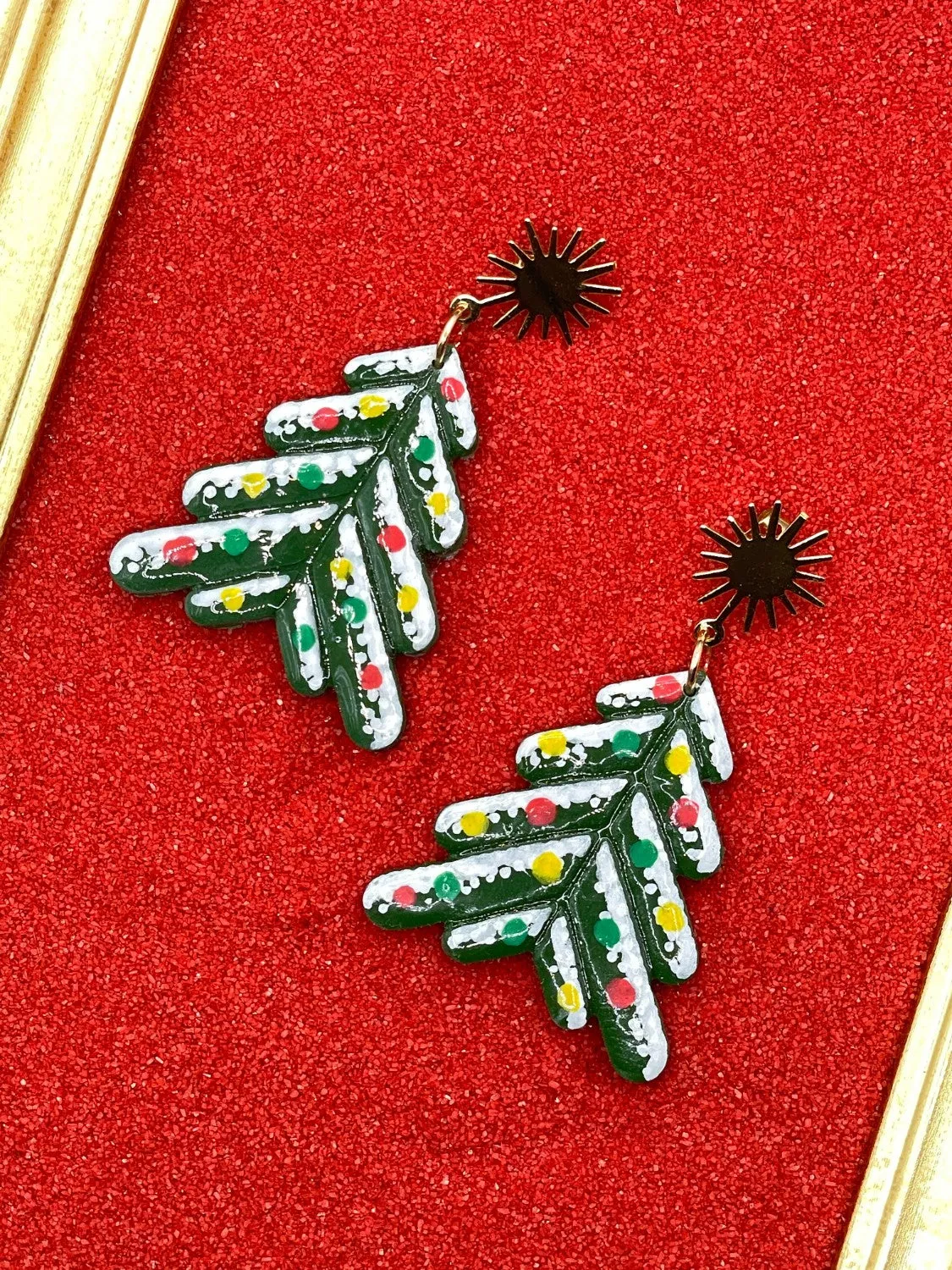 Snowy Christmas Tree Earrings sold by Modcloth