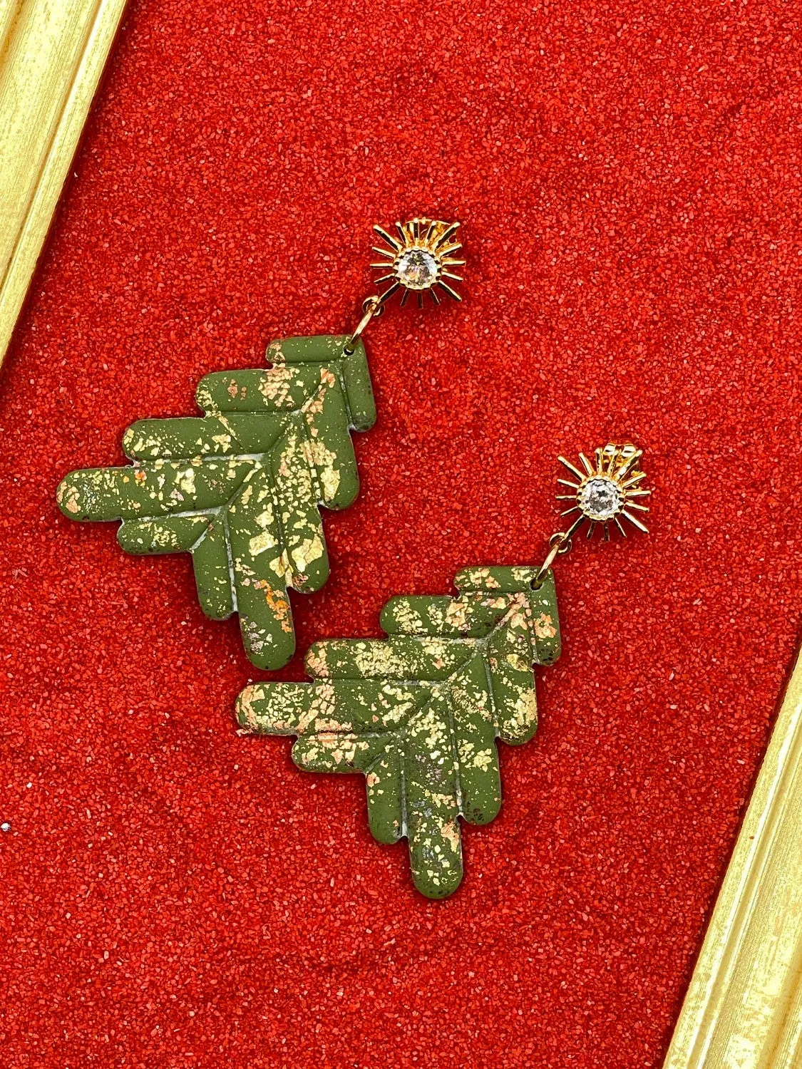 Little Gold Sparkly Tree Earrings sold by Modcloth