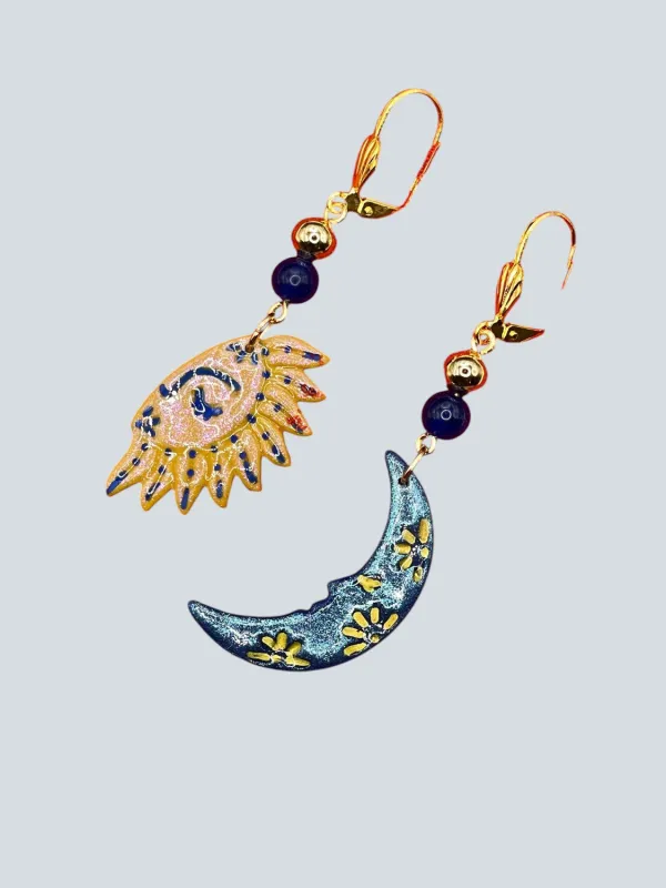 Sparkly Sun & Moon Earrings sold by Modcloth