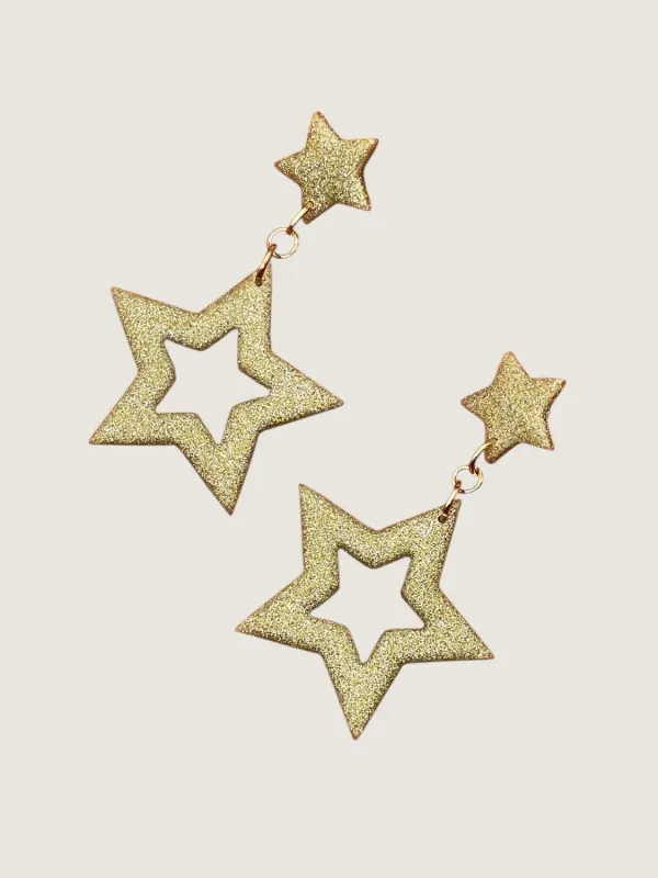 Gold Sparkly Star Earrings sold by Modcloth