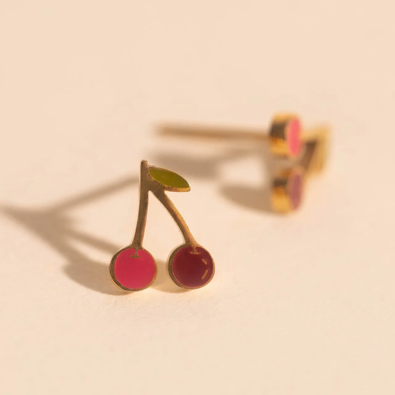 Mini Cherry Stud Earrings sold by Modcloth