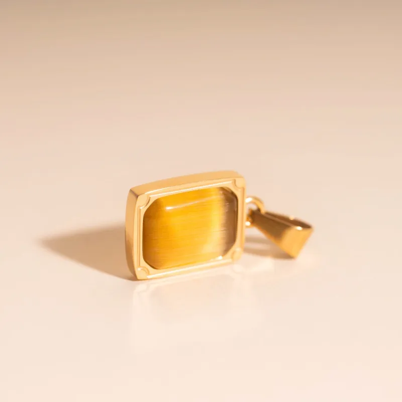 Golden Ember Necklace Charm sold by Modcloth