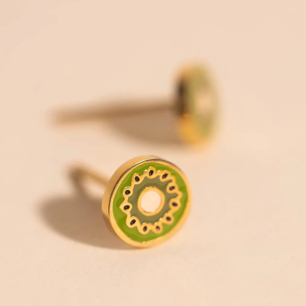 Mini Kiwi Stud Earrings sold by Modcloth