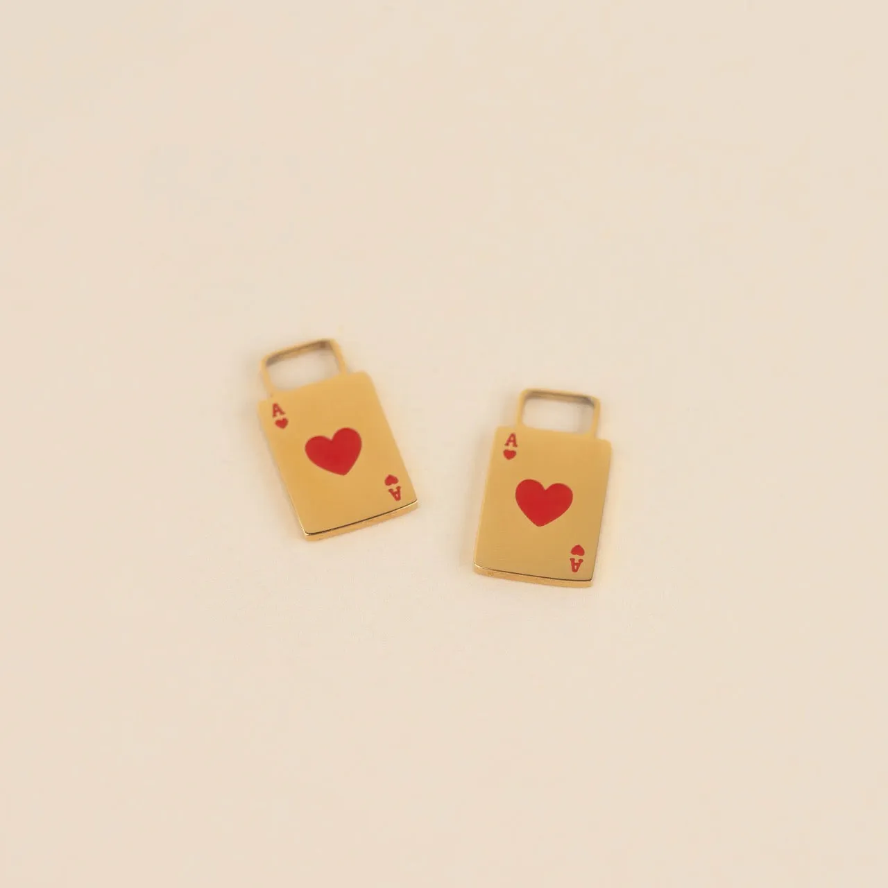Ace of Hearts Chunky Huggie Hoop Charms sold by Modcloth