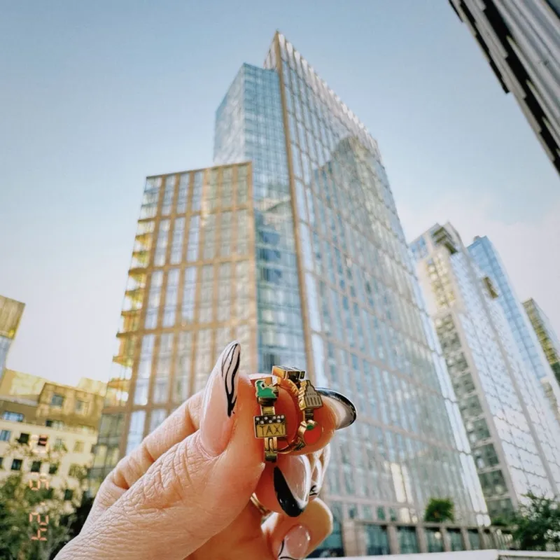 NYC 3D Huggie Hoop Earrings sold by Modcloth