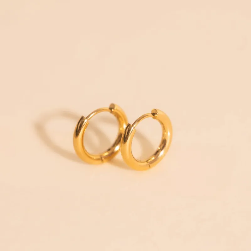 Mini Rounded Huggie Hoop Earrings sold by Modcloth