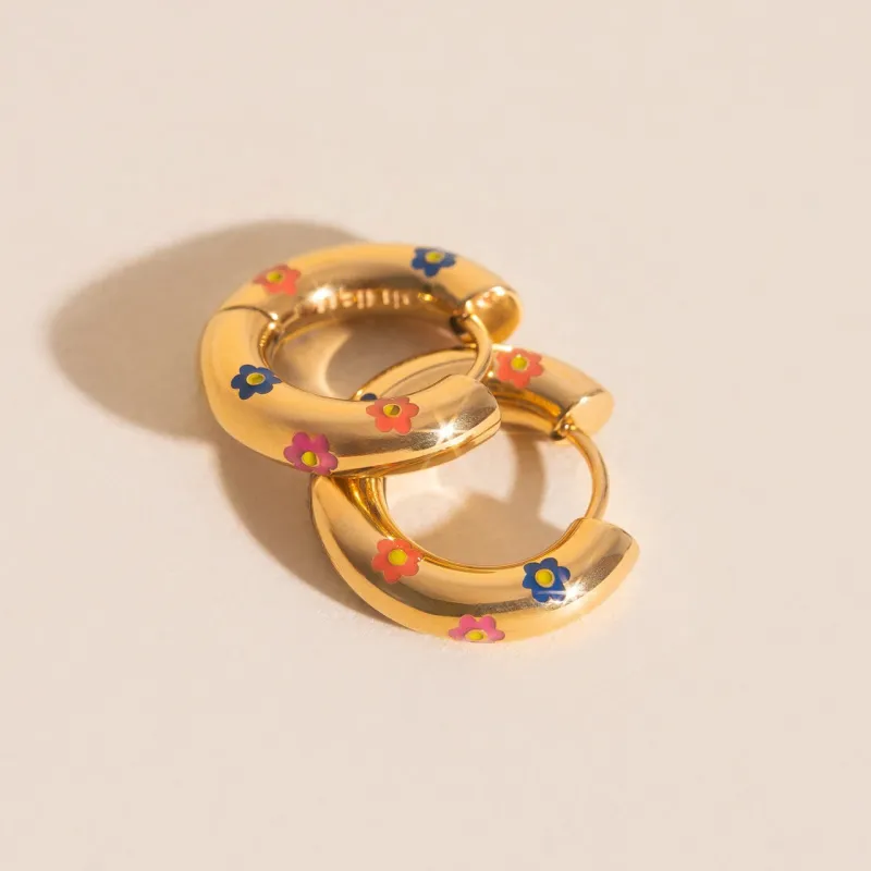 Daisy Chunky Rounded Huggie Hoop Earrings sold by Modcloth