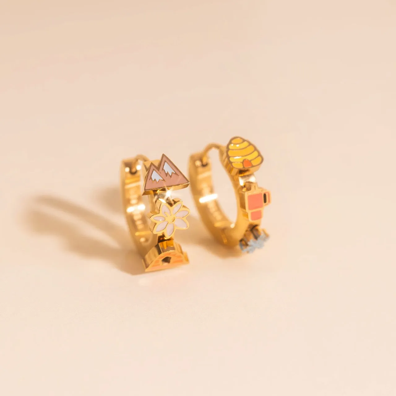 Utah 3D Huggie Hoop Earrings sold by Modcloth