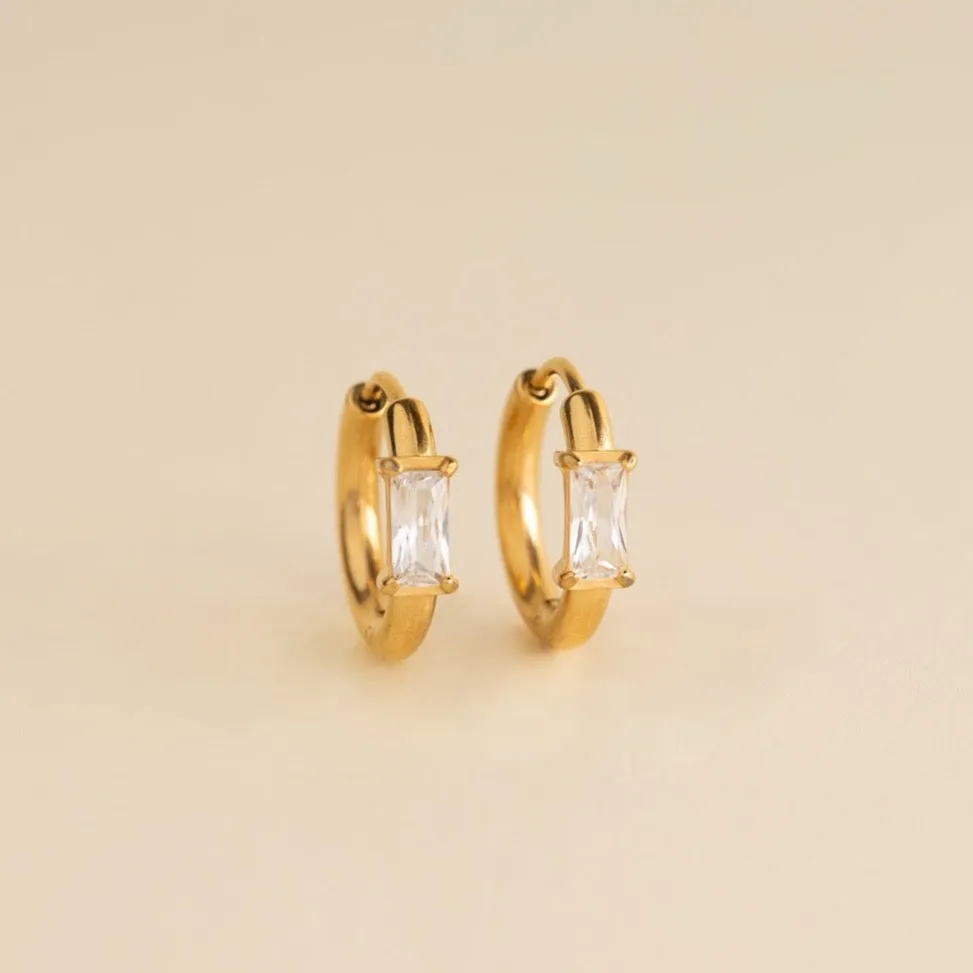 Baguette Crystal Rounded Huggie Hoop Earrings sold by Modcloth
