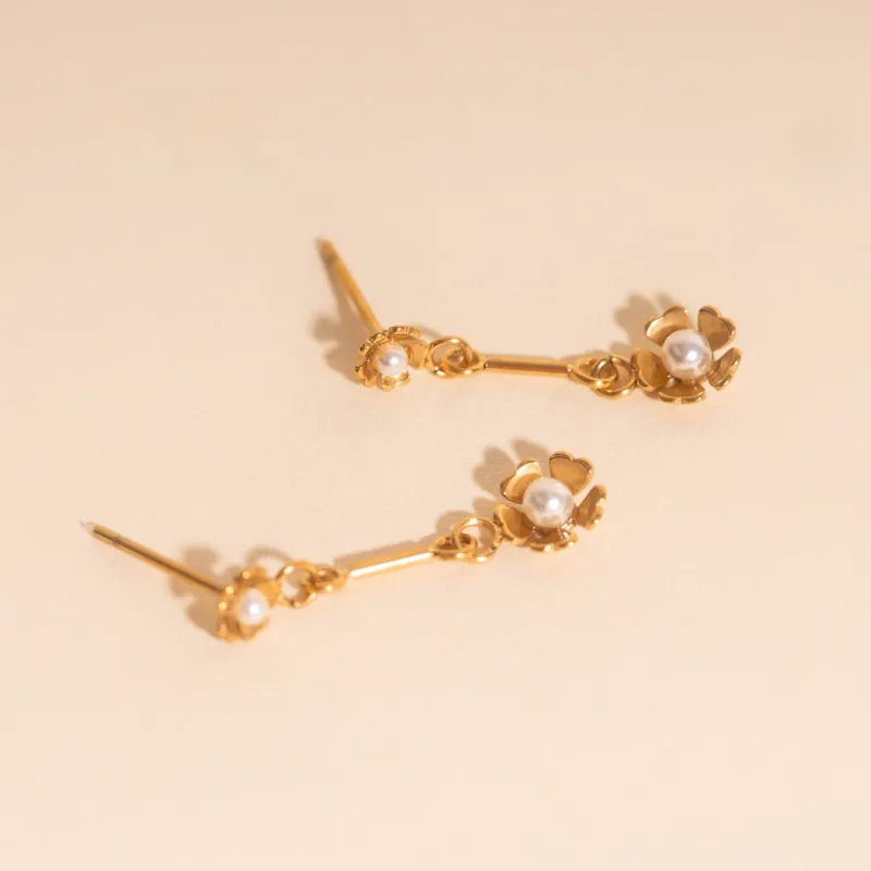 Pearl Flower Dangle Stud Earrings sold by Modcloth