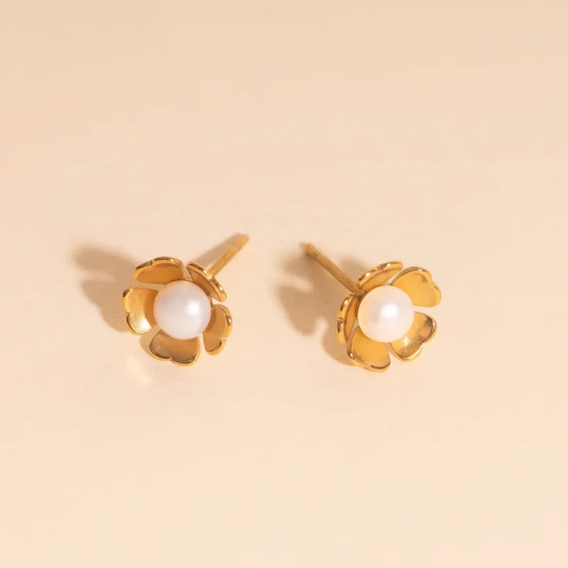 Pearl Flower Studs sold by Modcloth