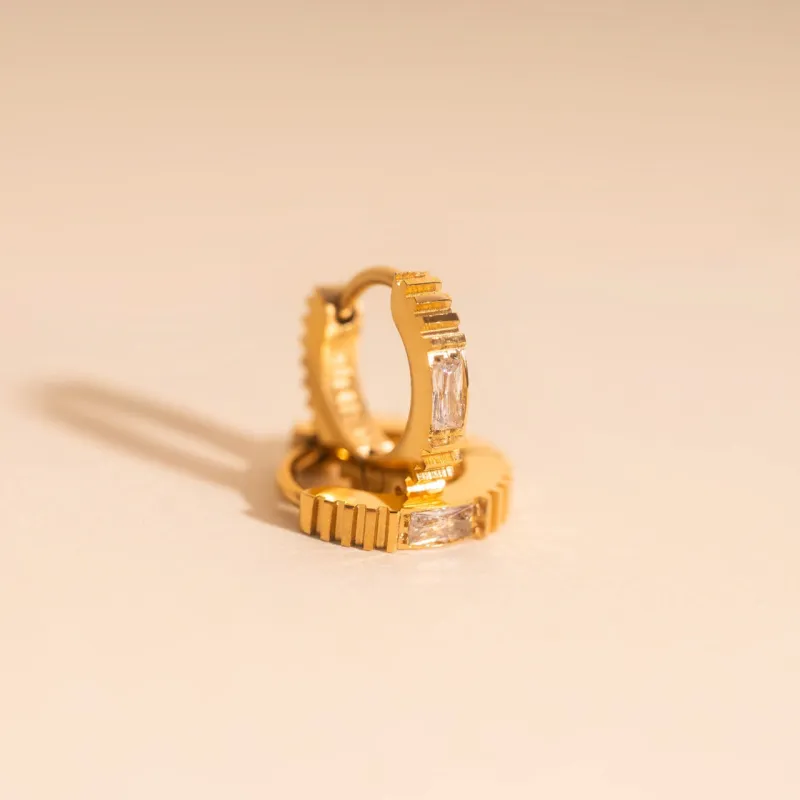 Crystal Textured Tiny Huggie Hoop Earrings sold by Modcloth