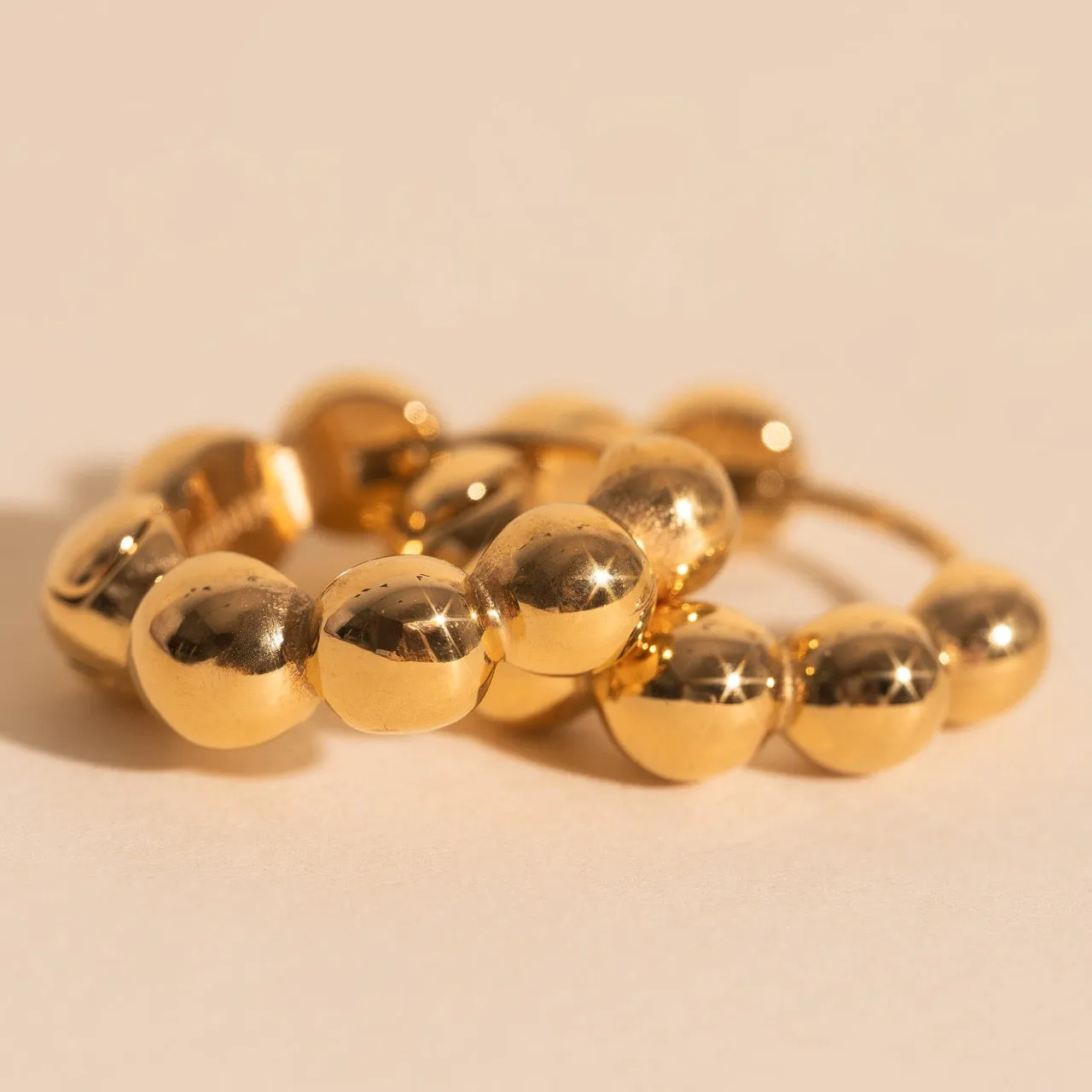 Bubble Chunky Rounded Huggie Hoop Earrings sold by Modcloth product image thumbnail 4