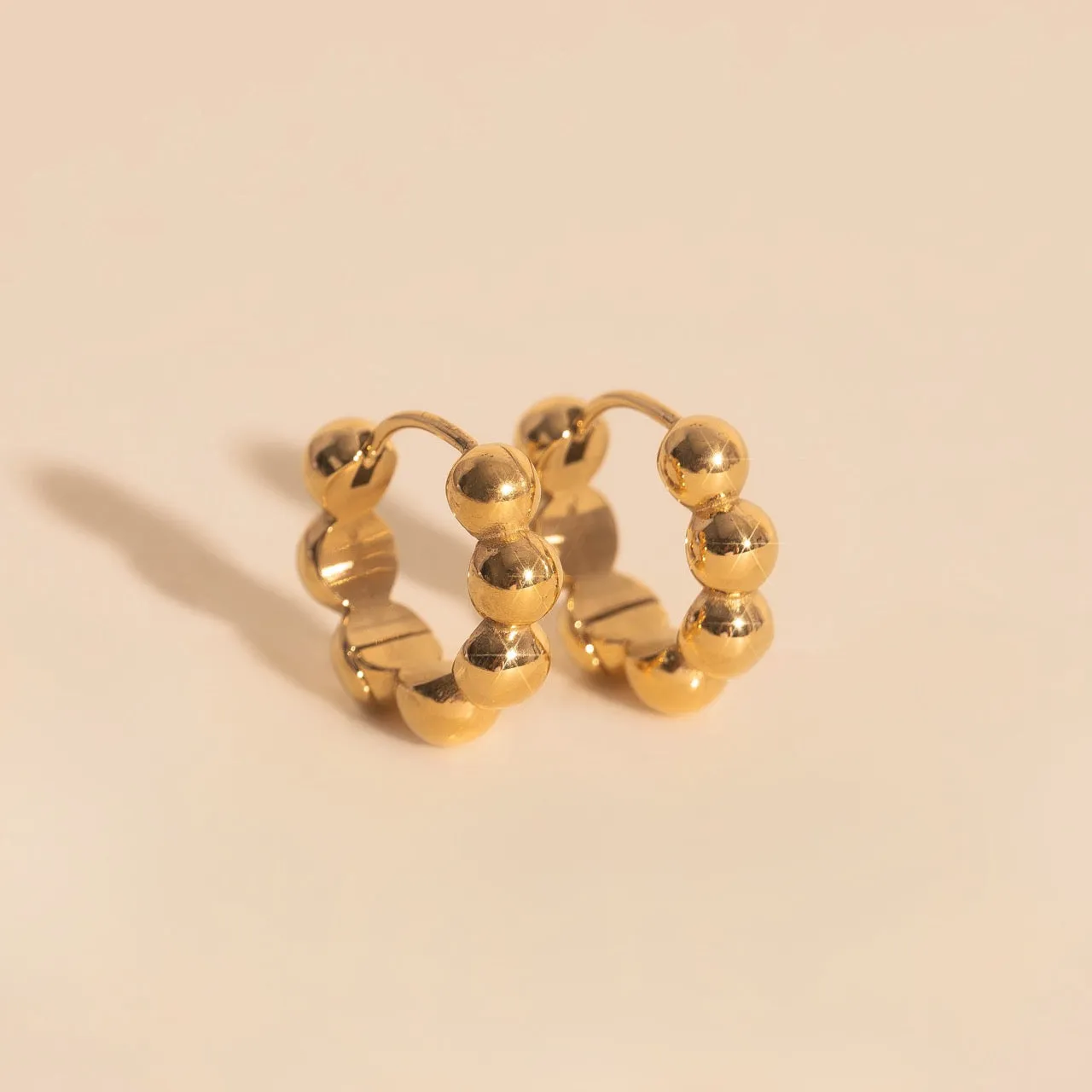 Bubble Chunky Rounded Huggie Hoop Earrings sold by Modcloth