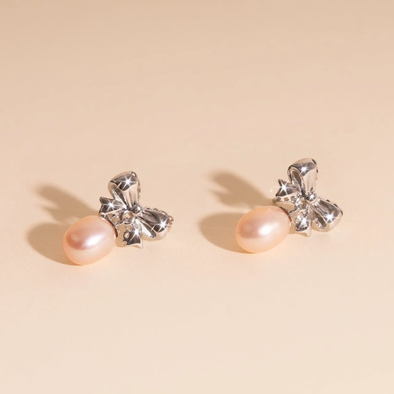 Bow Pearl Drop Stud Earrings sold by Modcloth product image thumbnail 4