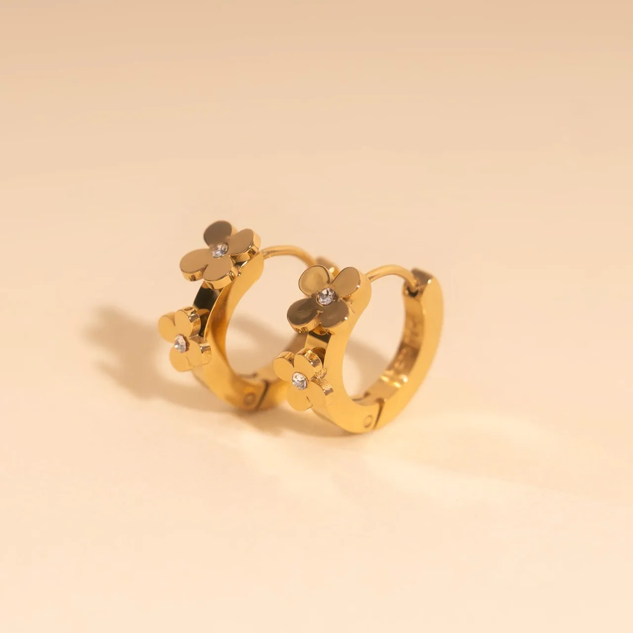 Crystal Flower 3D Huggie Hoop Earrings sold by Modcloth