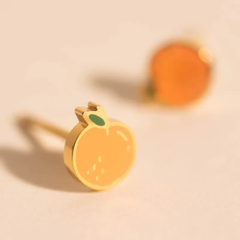 Mini Peach Stud Earrings sold by Modcloth