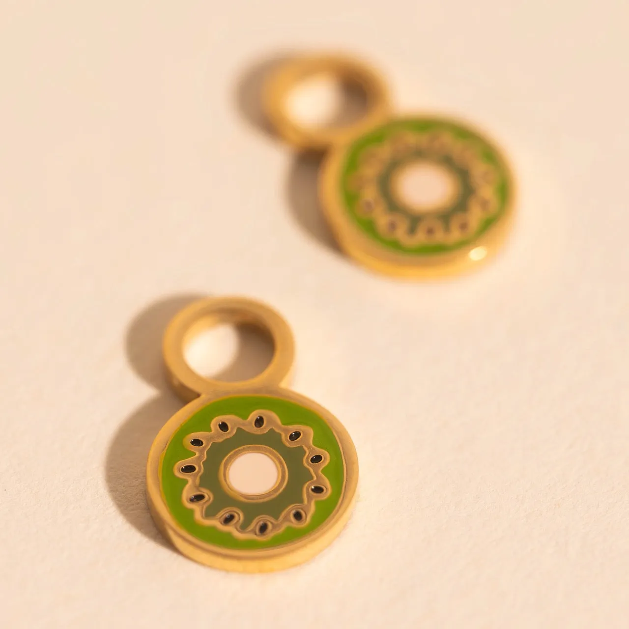 Mini Kiwi Huggie Hoop Charms sold by Modcloth