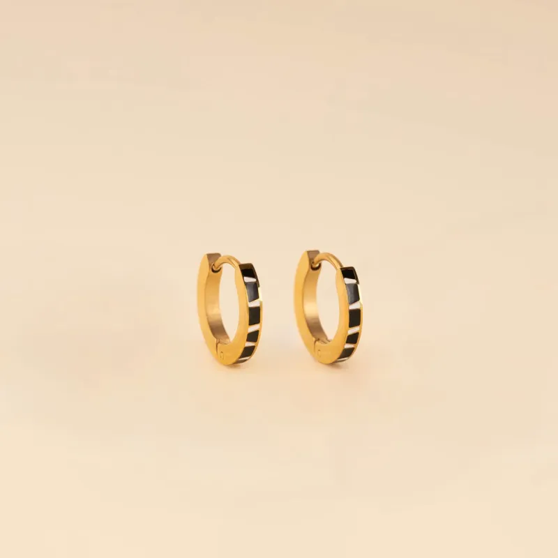 Zebra-print Huggie Hoop Earrings sold by Modcloth