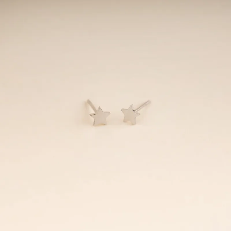 Mini Star Stud Earrings sold by Modcloth