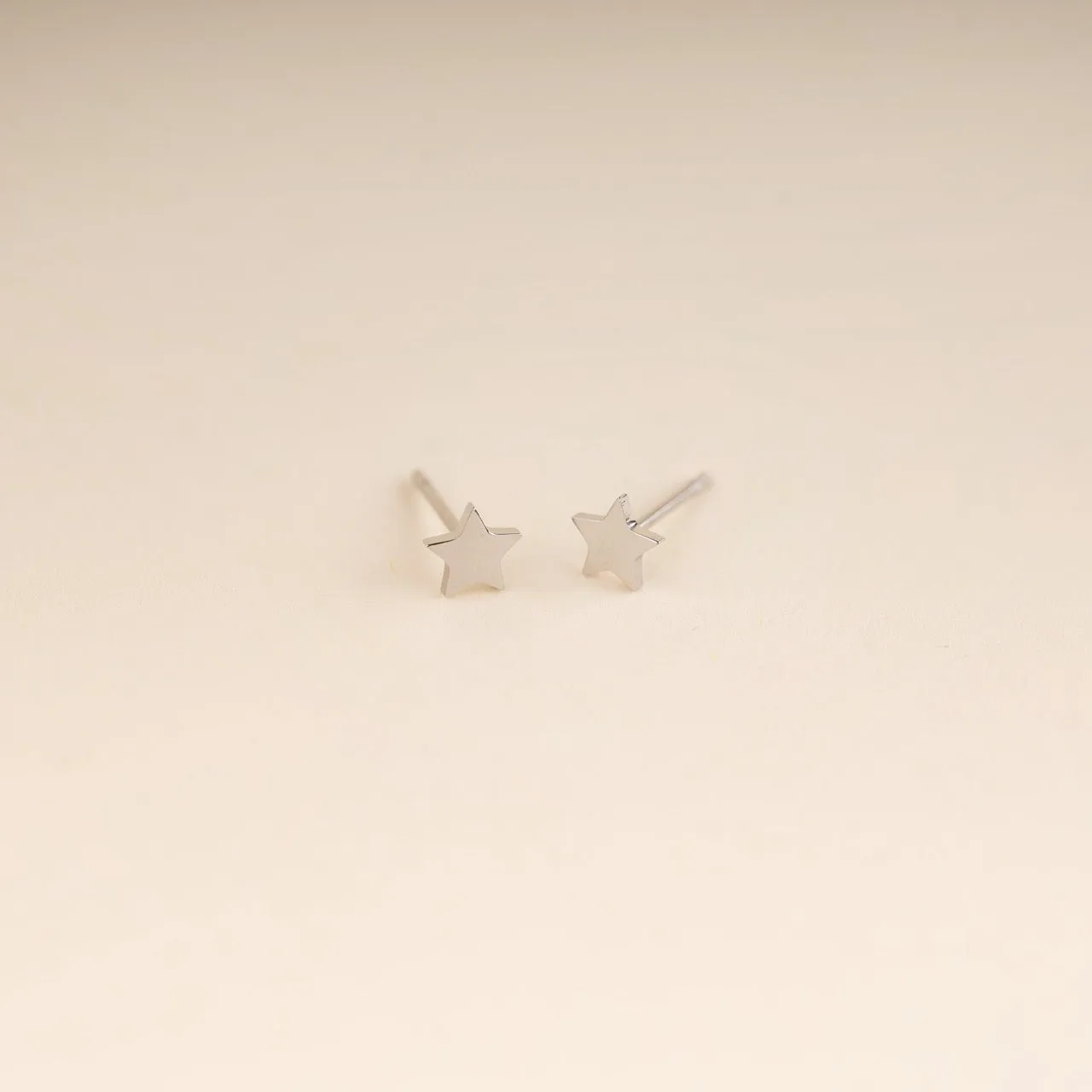 Mini Star Stud Earrings sold by Modcloth