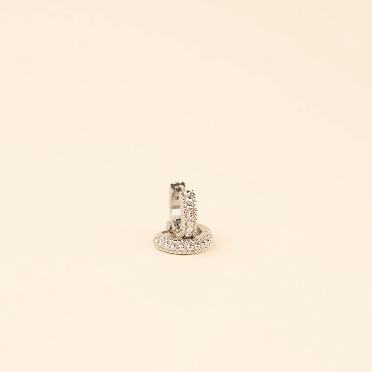 Dotted Chunky Huggie Hoop Earrings sold by Modcloth