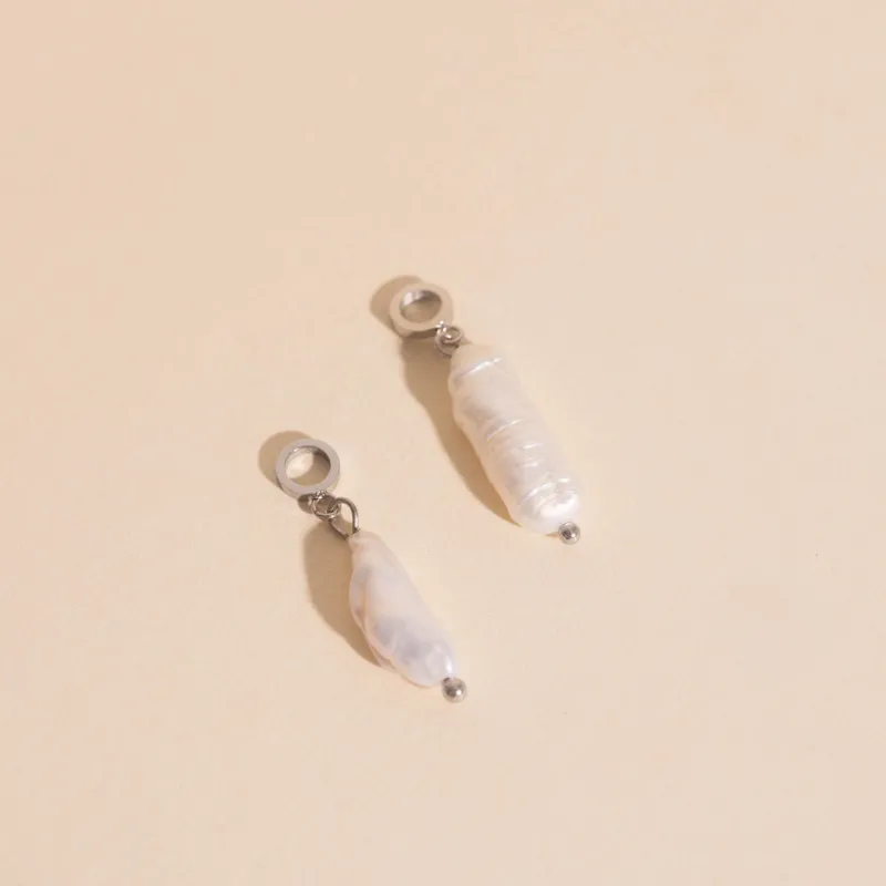 Baroque Natural Pearl Huggie Hoop Charms sold by Modcloth