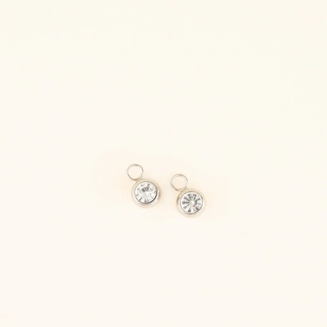 Round Crystal Huggie Hoop Charms sold by Modcloth