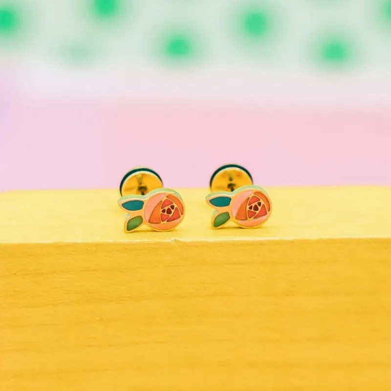 Rosette Earrings sold by Modcloth