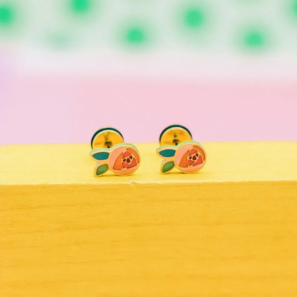 Rosette Earrings sold by Modcloth