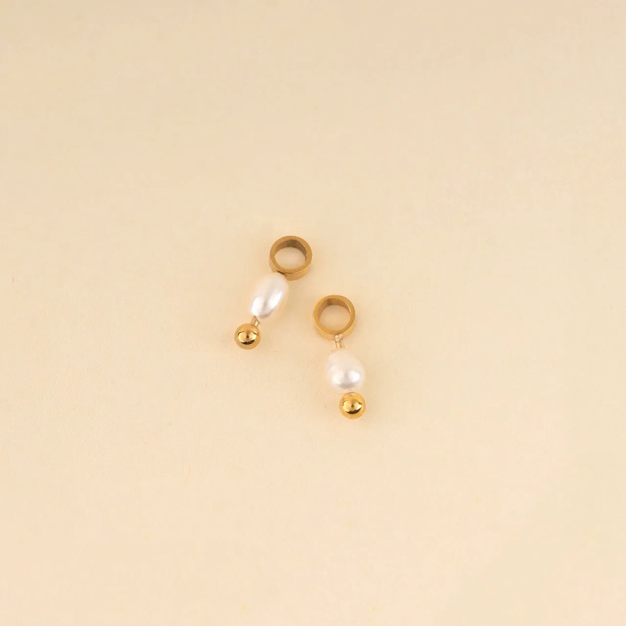 Mini Natural Pearl Huggie Hoop Charms sold by Modcloth