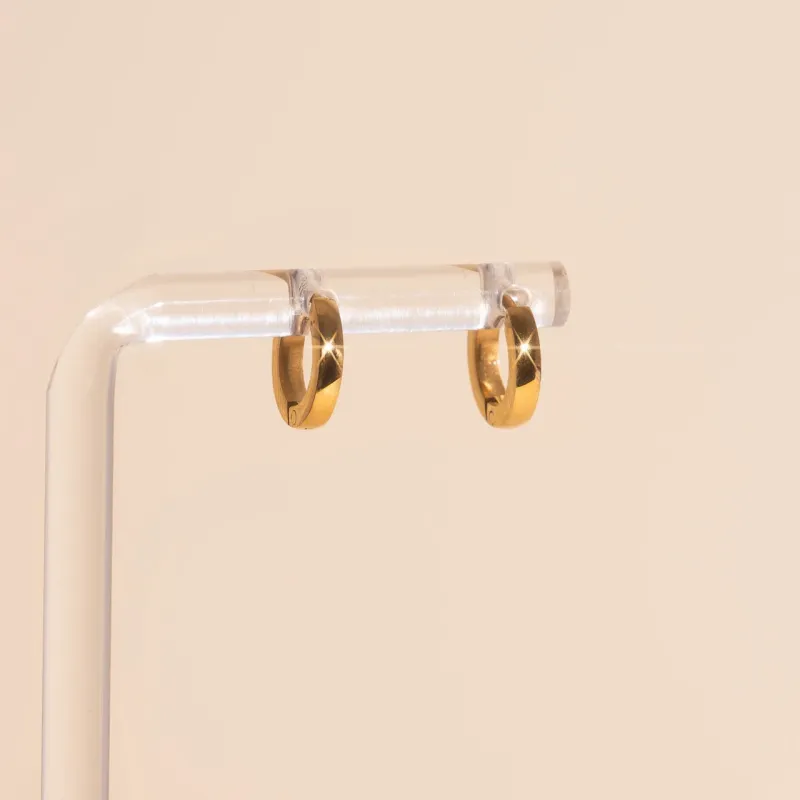 Smooth Tiny Huggie Hoop Earrings sold by Modcloth