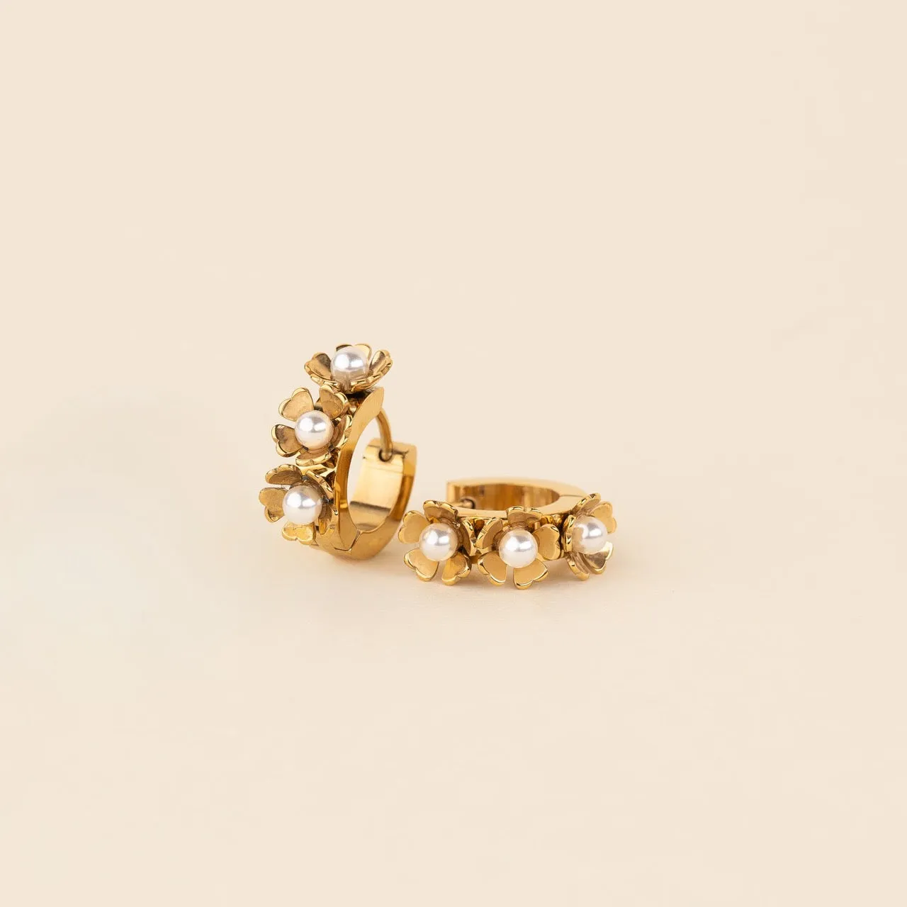 Pearl Flower Chunky 3D Huggie Hoop Earrings sold by Modcloth