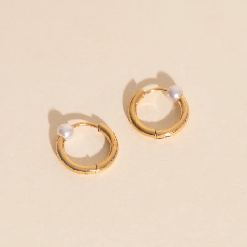 Pearl Huggie Hoop Earrings sold by Modcloth