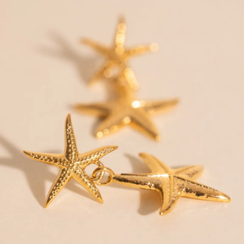 Starfish Dangle Stud Earrings sold by Modcloth