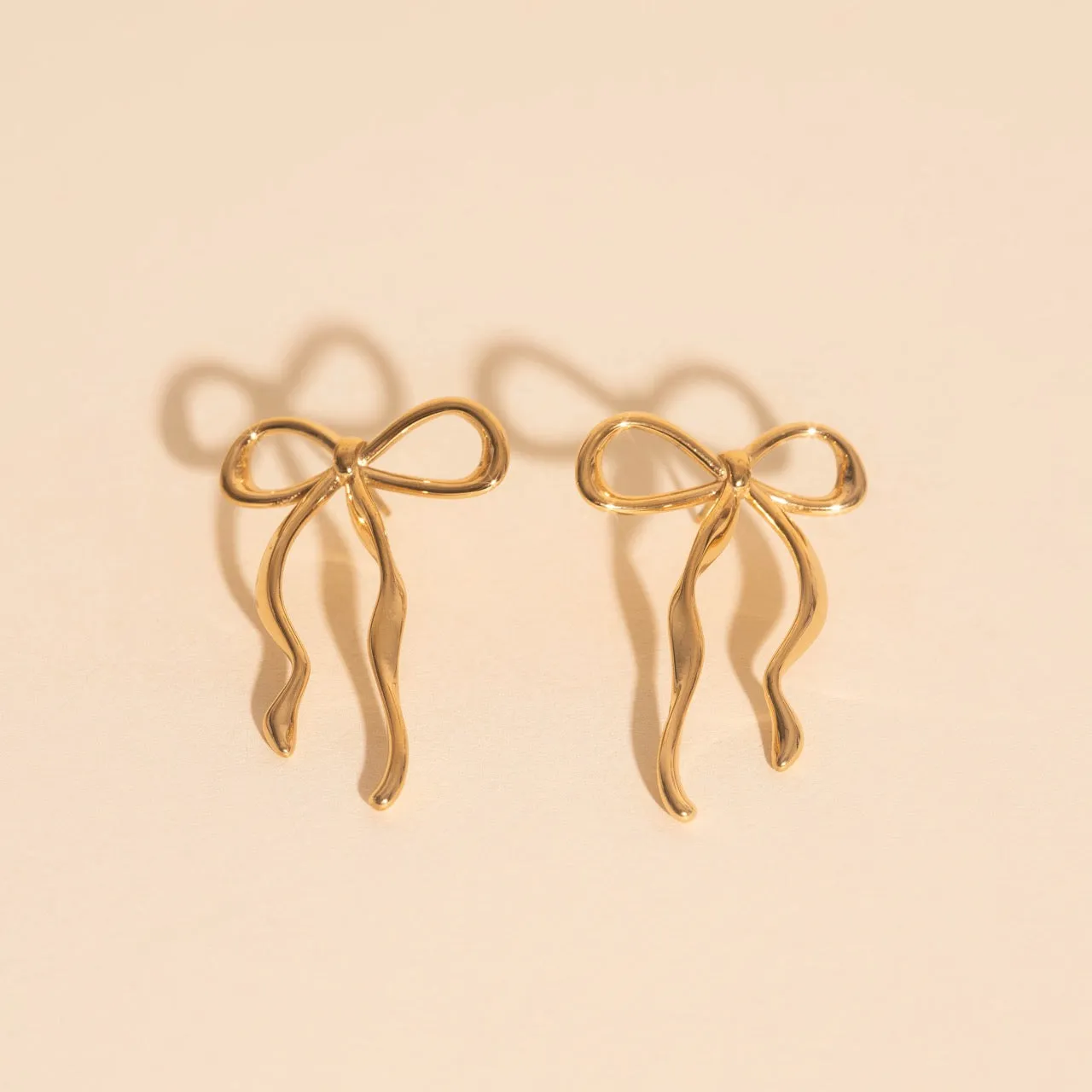 Jumbo Bow Stud Earrings sold by Modcloth