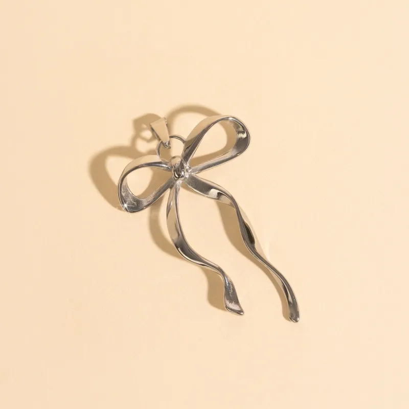 Jumbo Bow Necklace Charm sold by Modcloth