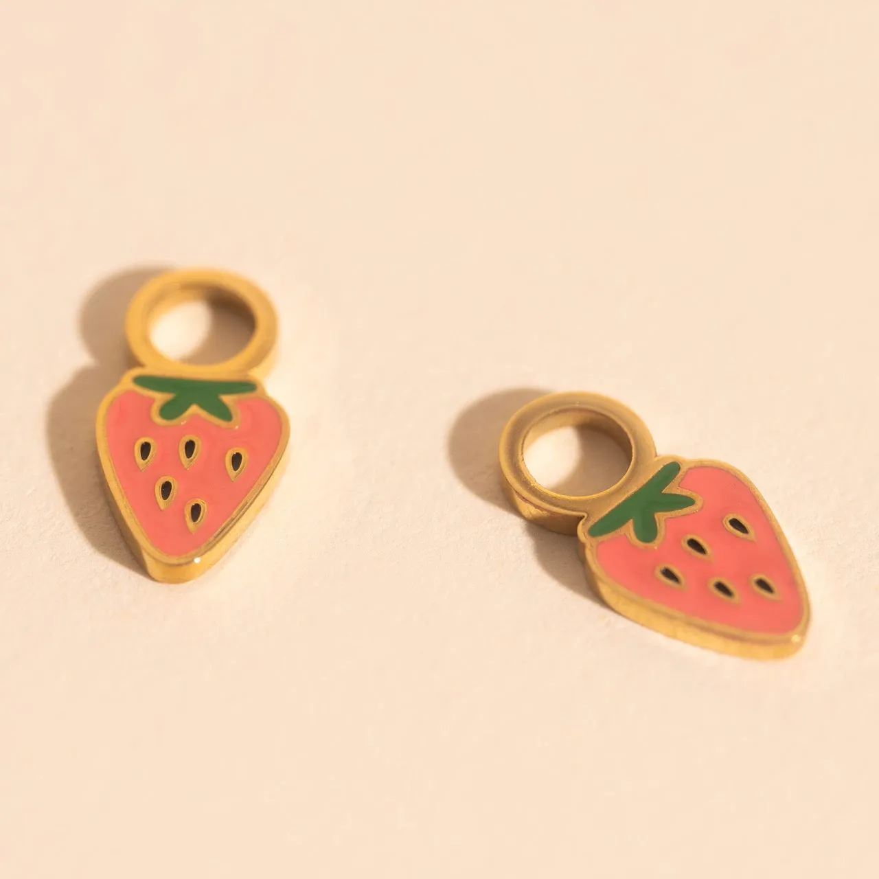 Mini Strawberry Huggie Hoop Charms sold by Modcloth