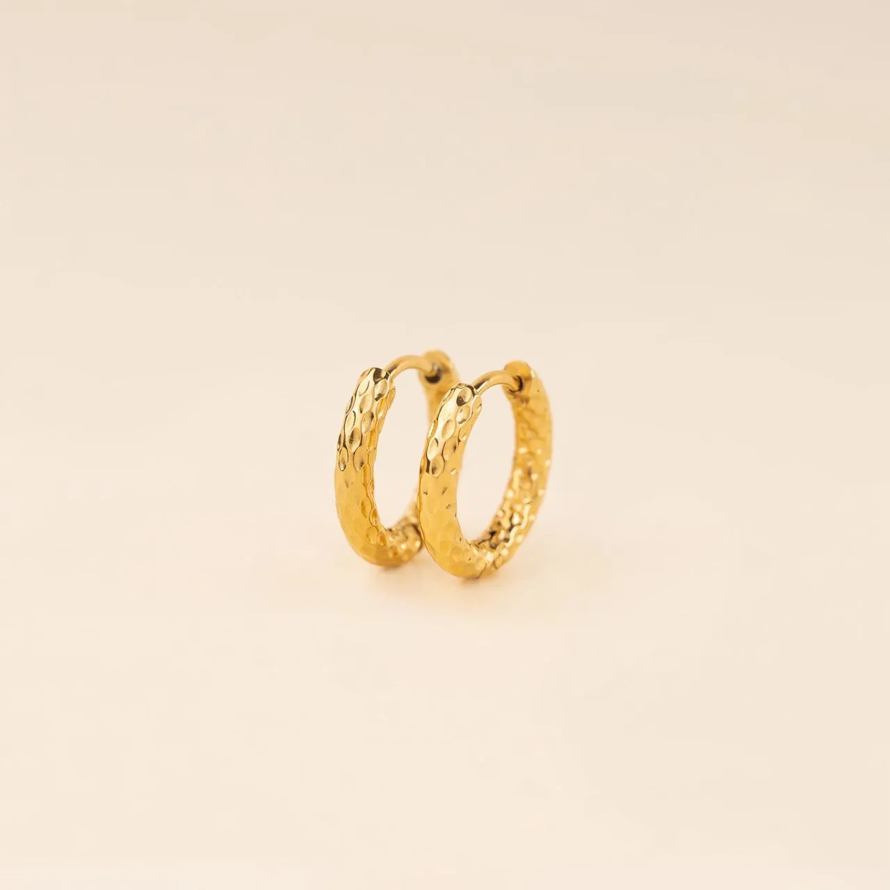 Hammered Rounded Huggie Hoop Earrings sold by Modcloth