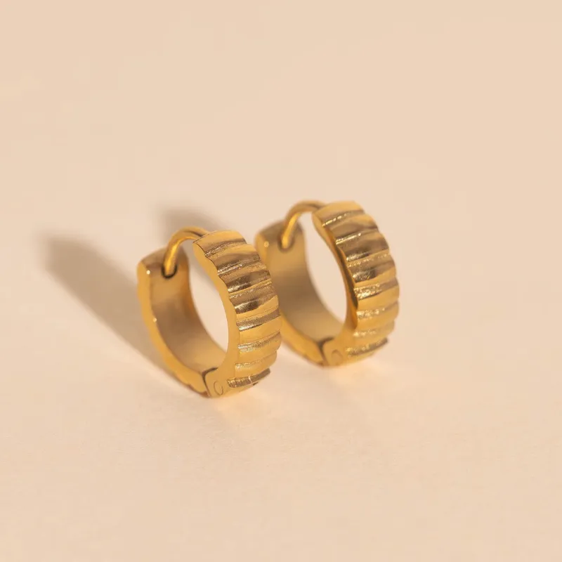 Scalloped Chunky Huggie Hoop Earrings sold by Modcloth