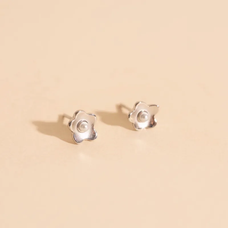 Mini Pearl Flower Stud Earrings sold by Modcloth