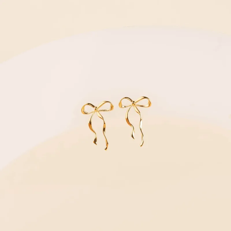 Dainty Bow Stud Earrings sold by Modcloth