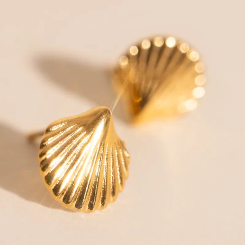 Mini Seashell Stud Earrings sold by Modcloth