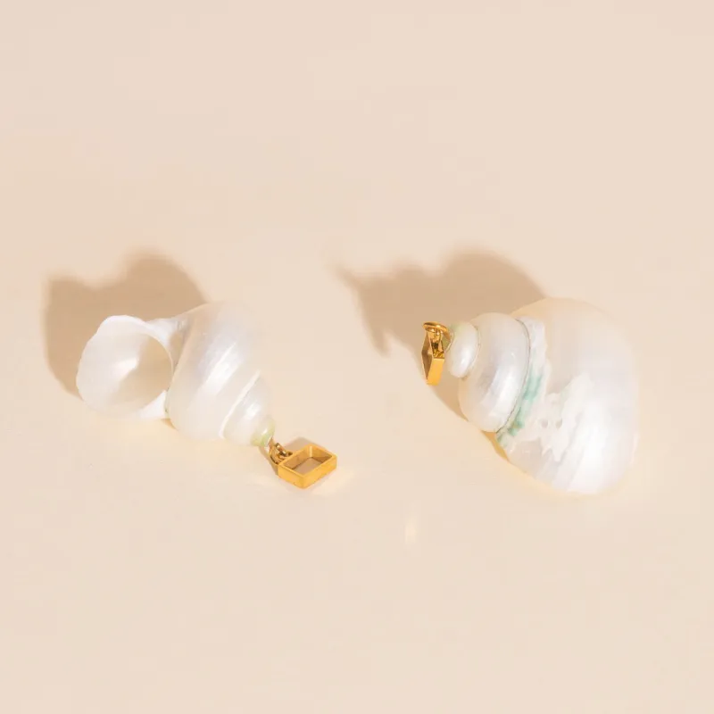 Jumbo Shell Super Chunky Huggie Hoop Charms sold by Modcloth