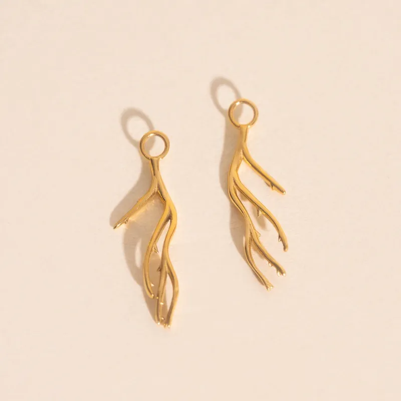 Coral Huggie Hoop Charms sold by Modcloth