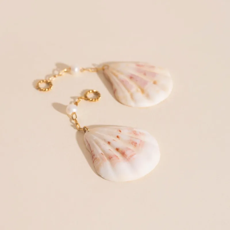 Jumbo Seashell Dangle Huggie Hoop Charms sold by Modcloth