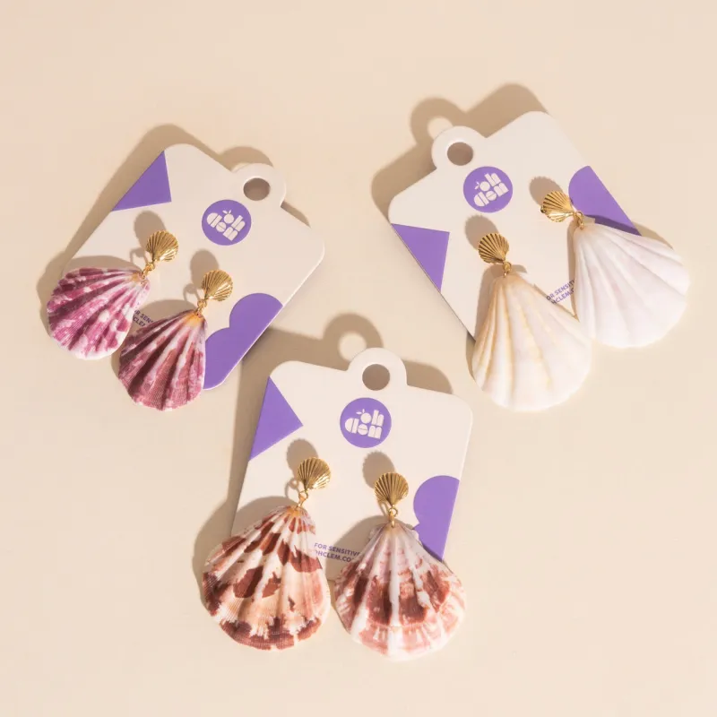 Seashell Dangle Stud Earrings sold by Modcloth