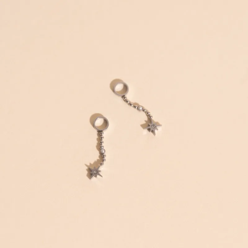 Dangle Starburst Huggie Hoop Charms sold by Modcloth